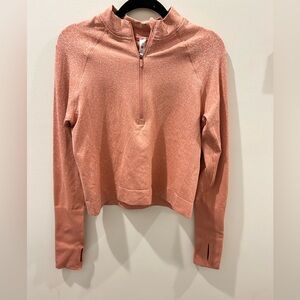 Size 10 fits smaller Lulu quarter zip